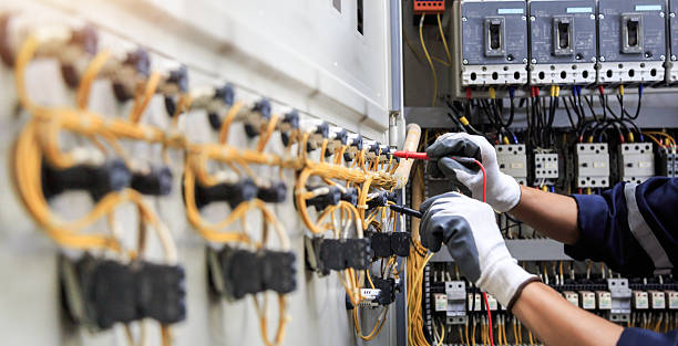 Professional Electrician technician working in Creola, AL